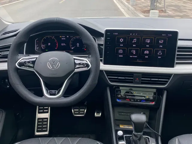 Volkswagen Tiguan L — Фото автомобиля 10