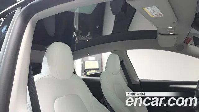 Tesla Model Y — Фото автомобиля 24