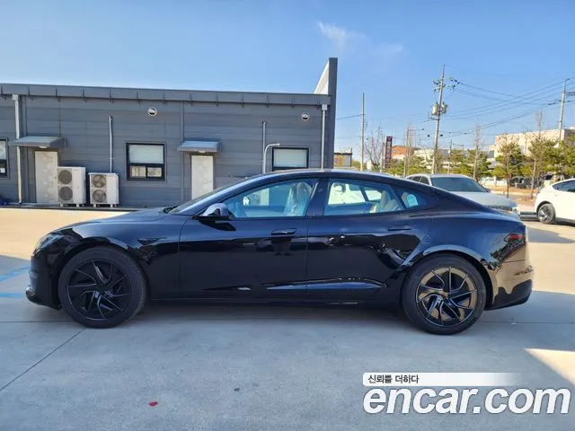 Tesla Model S — Фото автомобиля 4