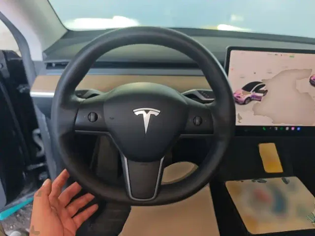 Tesla Model Y — Фото автомобиля 10