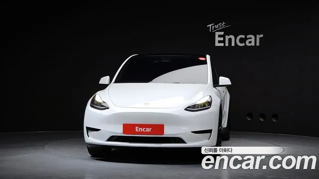 Tesla Model Y — Фото автомобиля 3