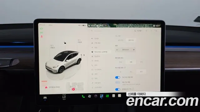 Tesla Model Y — Фото автомобиля 16