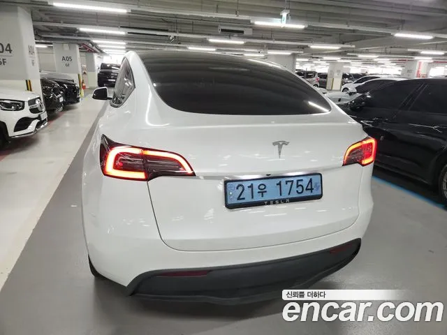 Tesla Model Y — Фото автомобиля 6