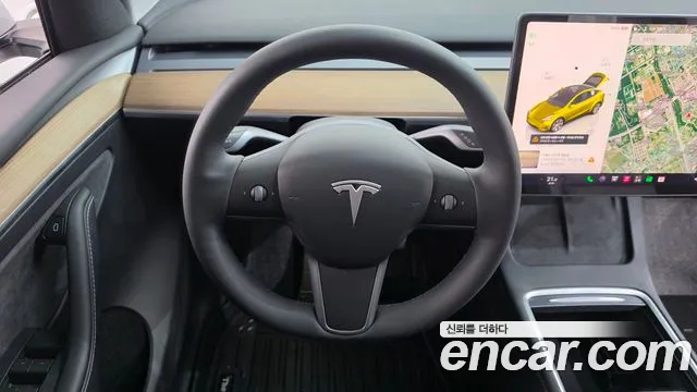 Tesla Model Y — Фото автомобиля 12