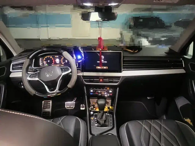 Volkswagen Tiguan L — Фото автомобиля 12