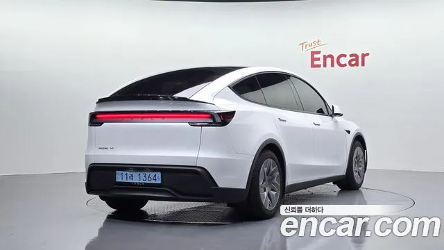 Tesla Model Y — Фото автомобиля 2