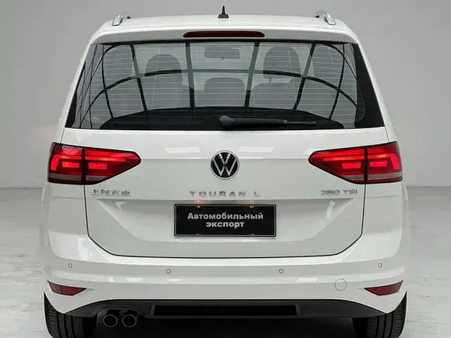 Volkswagen Touran — Фото автомобиля 11