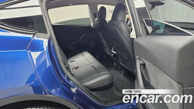 Tesla Model Y — Фото автомобиля 17
