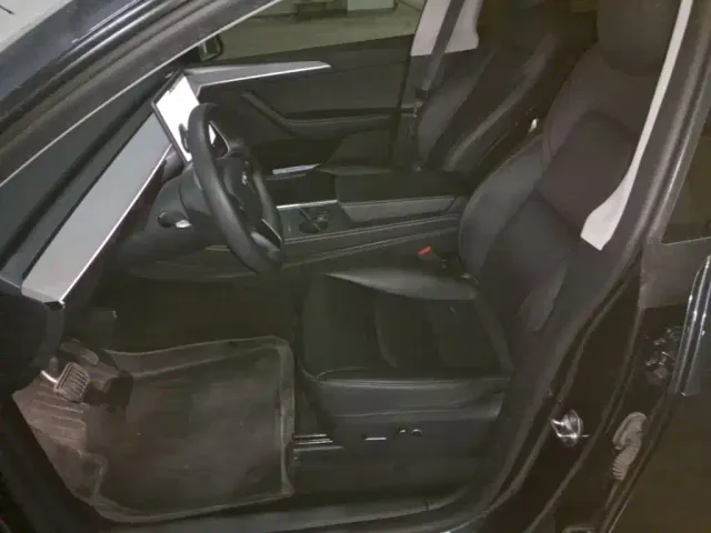 Tesla Model Y — Фото автомобиля 14