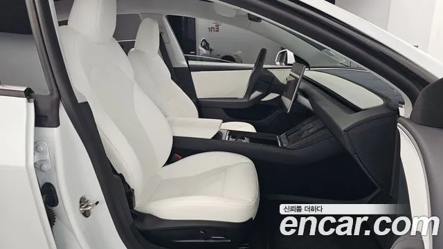 Tesla Model 3 — Фото автомобиля 18