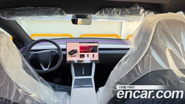 Tesla Model Y — Фото автомобиля 16