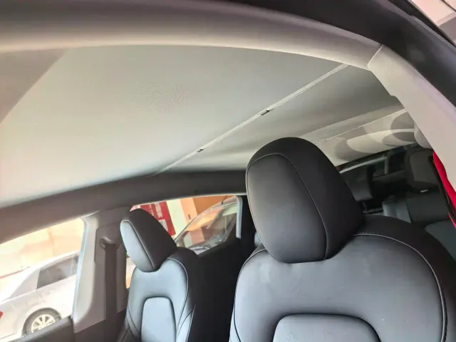 Tesla Model Y — Фото автомобиля 11