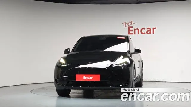 Tesla Model Y — Фото автомобиля 2