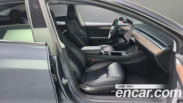 Tesla Model 3 — Фото автомобиля 15