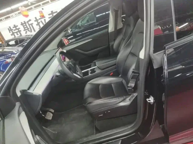 Tesla Model Y — Фото автомобиля 14