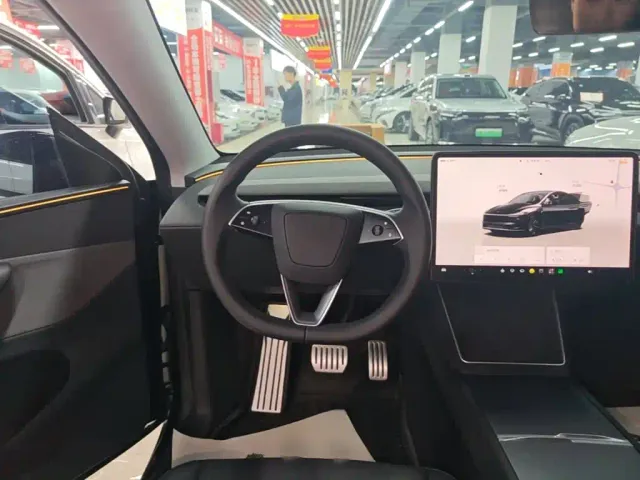 Tesla Model Y — Фото автомобиля 10