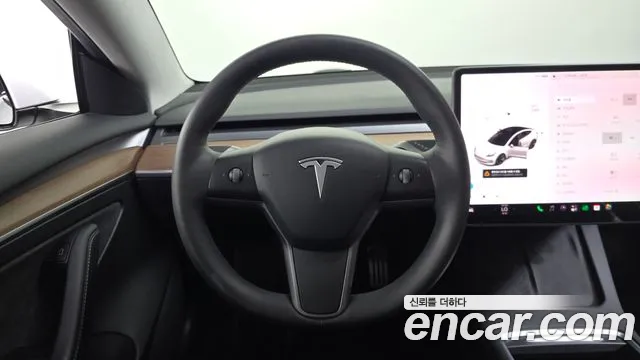 Tesla Model 3 — Фото автомобиля 11