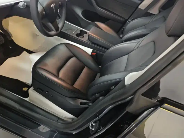 Tesla Model Y — Фото автомобиля 14