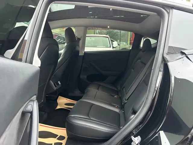 Tesla Model Y — Фото автомобиля 9