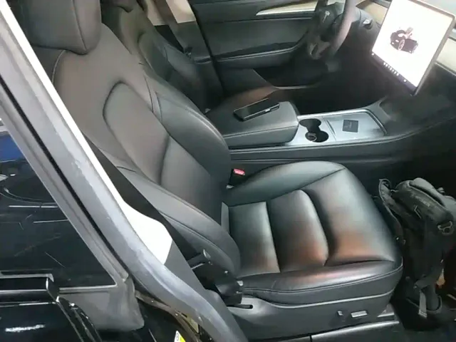 Tesla Model Y — Фото автомобиля 24