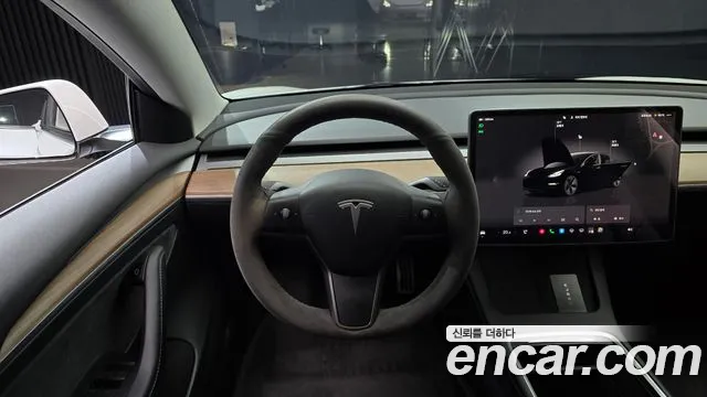 Tesla Model 3 — Фото автомобиля 13