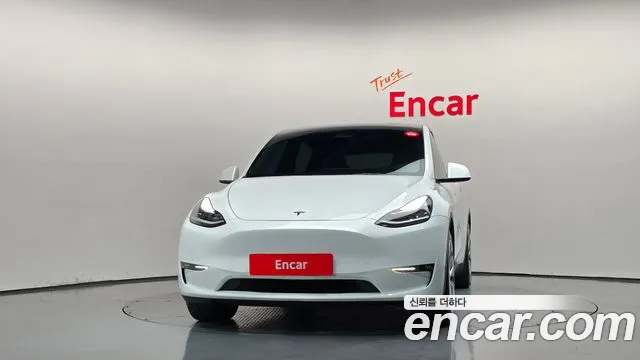 Tesla Model Y — Фото автомобиля 3