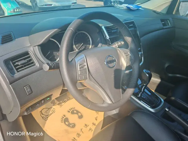Nissan Tiida — Фото автомобиля 8