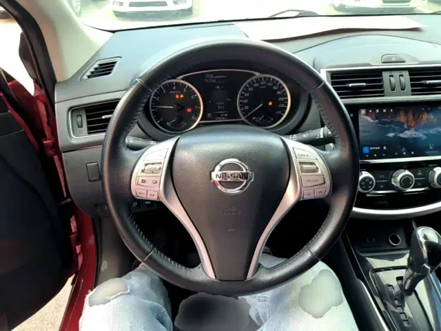 Nissan Tiida — Фото автомобиля 10