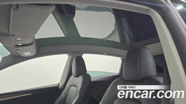 Tesla Model Y — Фото автомобиля 17