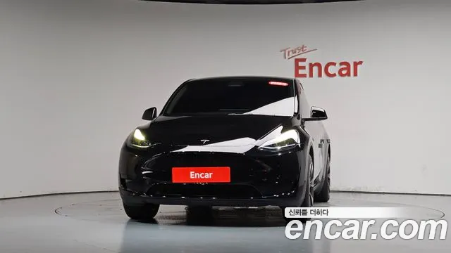 Tesla Model Y — Фото автомобиля 3