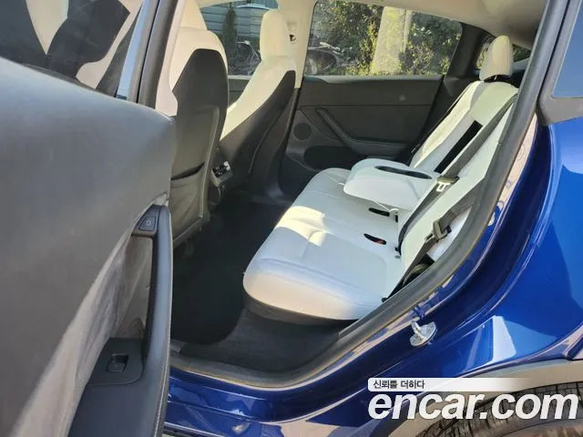 Tesla Model Y — Фото автомобиля 10