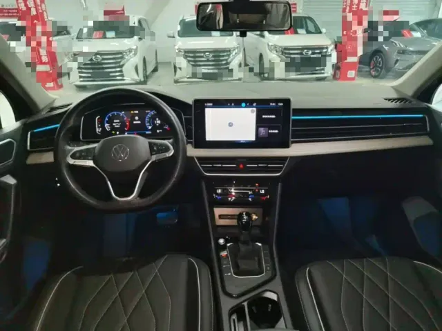 Volkswagen Tiguan L — Фото автомобиля 9