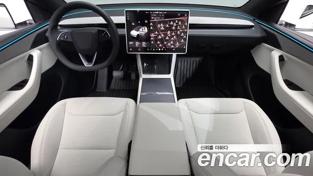 Tesla Model Y — Фото автомобиля 10