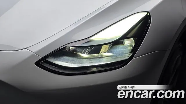 Tesla Model Y — Фото автомобиля 7