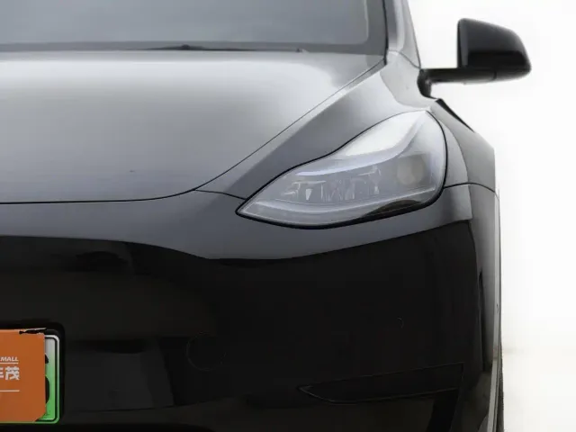 Tesla Model Y — Фото автомобиля 14
