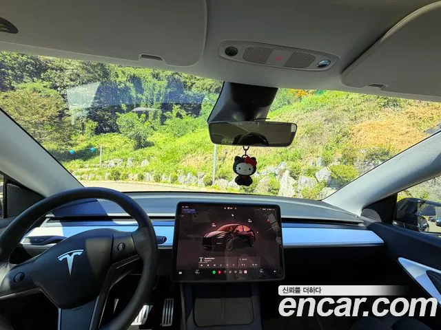 Tesla Model Y — Фото автомобиля 6