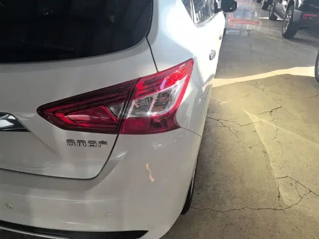 Nissan Tiida — Фото автомобиля 7