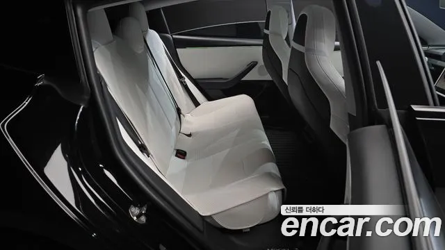 Tesla Model 3 — Фото автомобиля 11