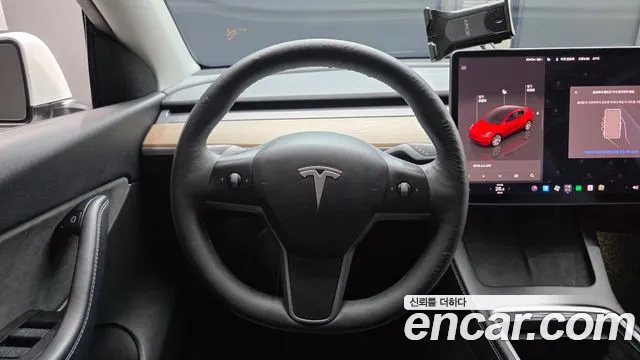 Tesla Model Y — Фото автомобиля 12