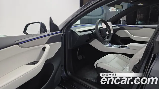 Tesla Model Y — Фото автомобиля 15