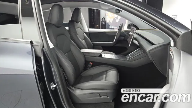 Tesla Model Y — Фото автомобиля 10