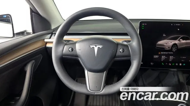 Tesla Model Y — Фото автомобиля 19