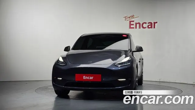 Tesla Model Y — Фото автомобиля 3