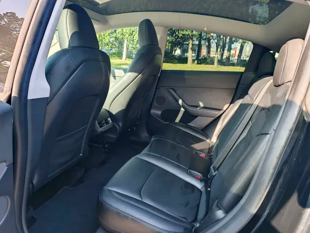 Tesla Model Y — Фото автомобиля 8