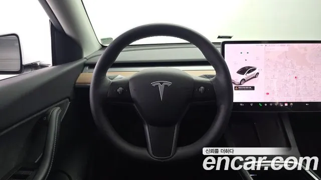 Tesla Model Y — Фото автомобиля 11
