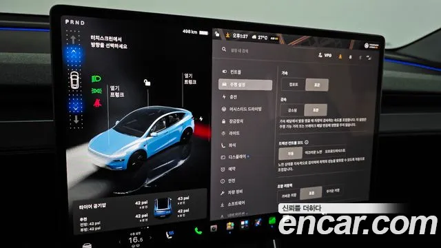 Tesla Model Y — Фото автомобиля 28