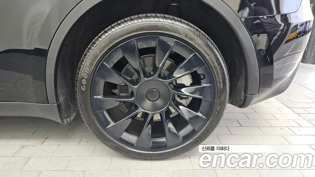 Tesla Model Y — Фото автомобиля 6
