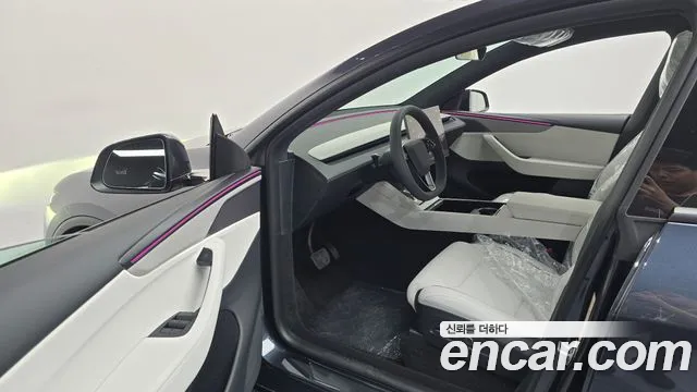 Tesla Model Y — Фото автомобиля 10