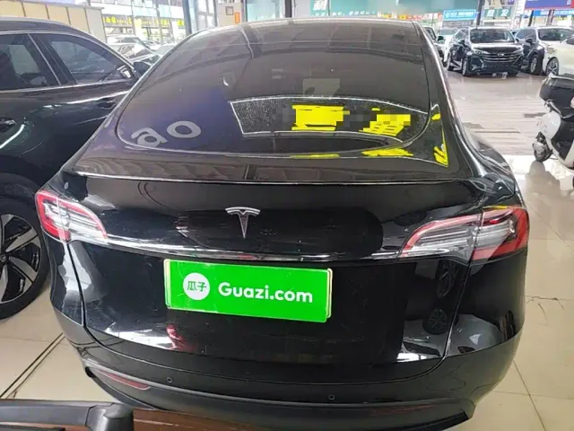 Tesla Model Y — Фото автомобиля 5