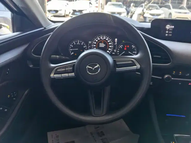 Mazda Axela — Фото автомобиля 15